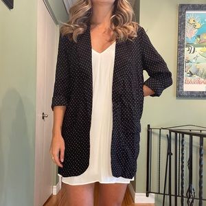 Black and white polka dot long blazer from Mango.